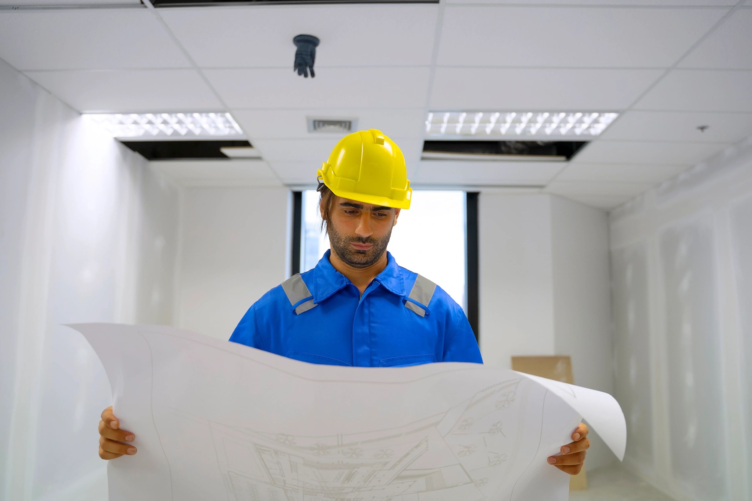 Engineer inspecting a high-rise construction project