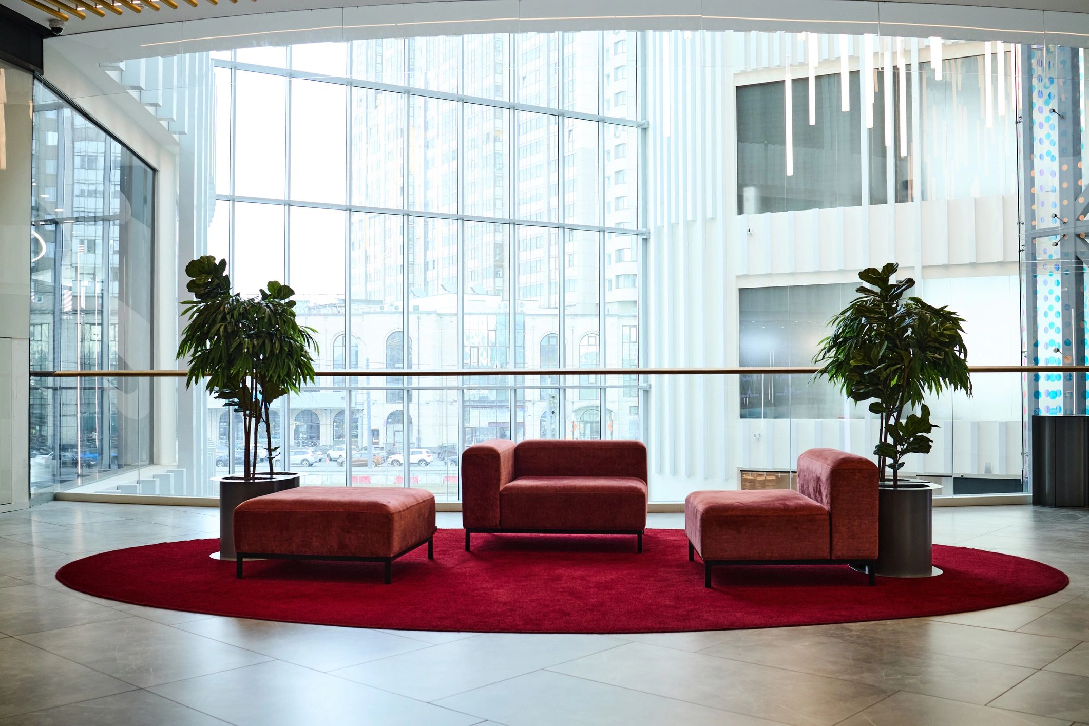Modern corporate lobby with lounge seating and natural light